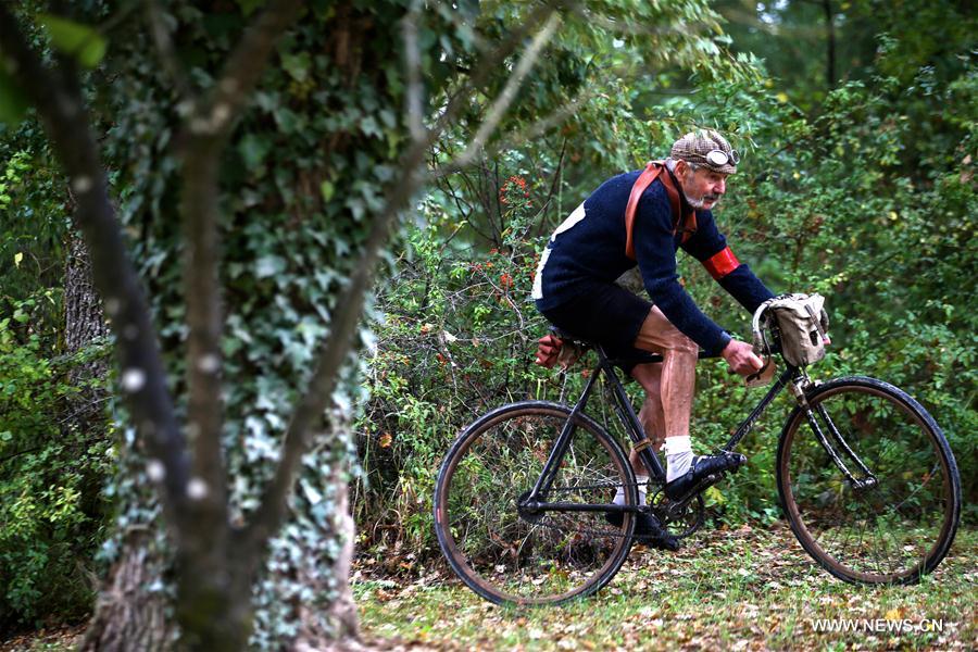 More than 6,000 cyclists from 65 countries and regions, wearing vintage cycling jerseys, riding vintage bicycles built in 1987 or earlier, took part in the 'Eroica' (heroic) cycling event through the Strade Bianche, the gravel roads of the Chianti area of Tuscany.