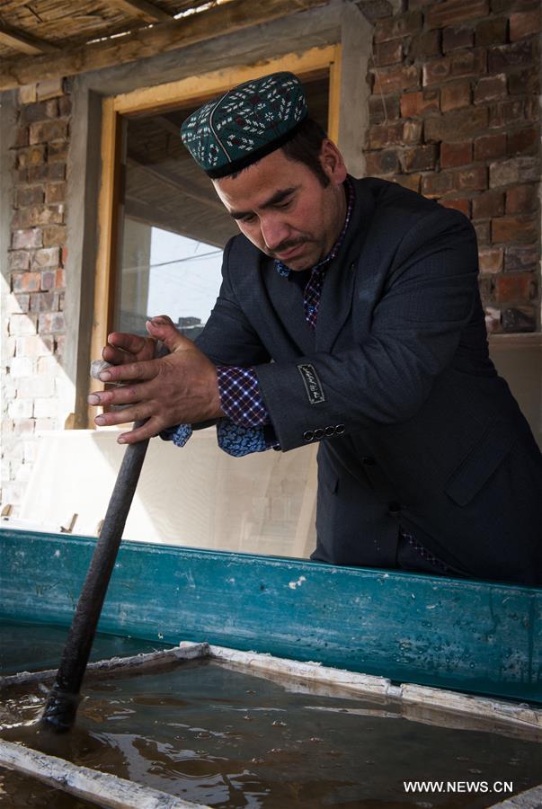 The handmade mulberry-bark paper, originating thousands of years ago in Xinjiang, has been listed as intangible cultural heritage by the UNESCO.