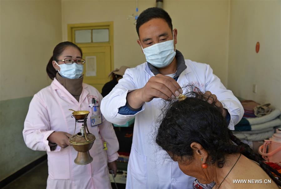 Tibetan medicine has absorbed the influences of traditional Chinese, Indian and Arab medicine and is mainly practiced in Tibet and the Himalayan region. It uses herbs, minerals and sometimes insects and animal parts. (Xinhua/Liu Dongjun)
