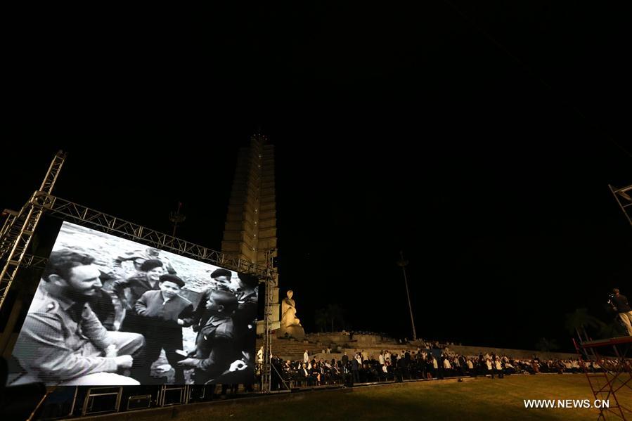 People take part in the tribute event to Cuban revolutionary leader Fidel Castro at Revolution Square, in Havana, Cuba, on Nov. 29, 2016.