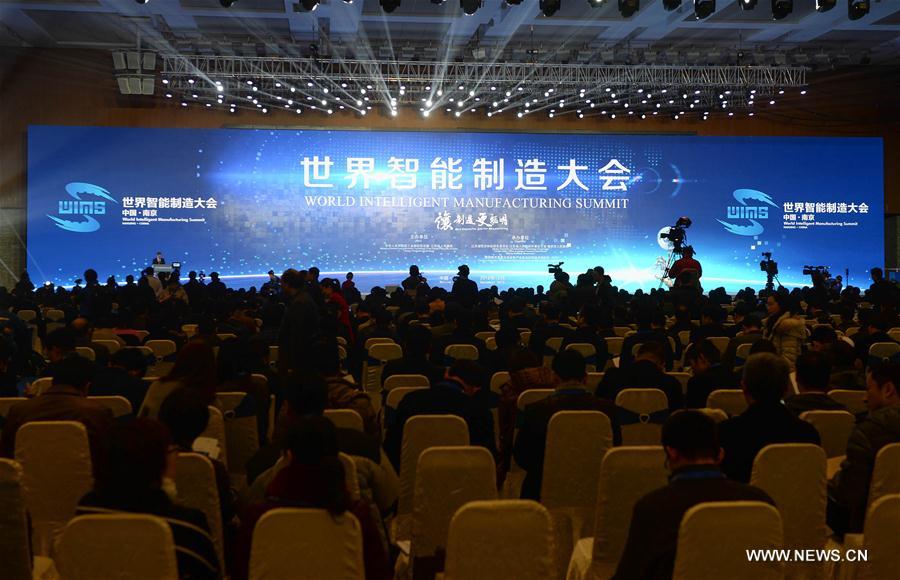 Attendees are seen at the World Intelligent Manufacturing Summit in Nanjing, capital of east China's Jiangsu Province, Dec. 7, 2016.