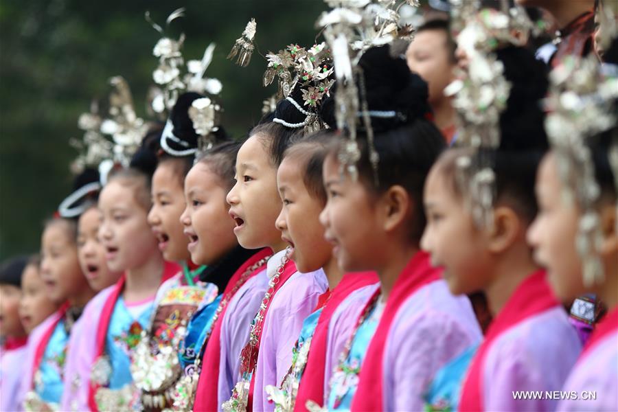 #Pupils of Dong ethnic group sing Ka Lau chorus, the big song of their distinguished folk vocal art, at Chemin Primary School of Guzhou Town in Rongjiang County, southwest China's Guizhou Province, Dec. 8, 2016. 