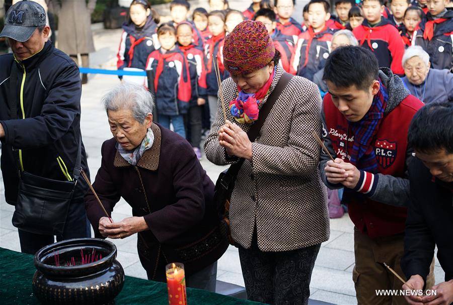  A series of ceremonies were held by people to mourn their family members killed in the 1937 massacre ahead of the National Memorial Day for Nanjing Massacre Victims, which falls on Dec. 13. Japanese troops captured Nanjing, then China's capital, on Dec. 13 of 1937 and started a campaign of slaughter lasting longer than a month. 