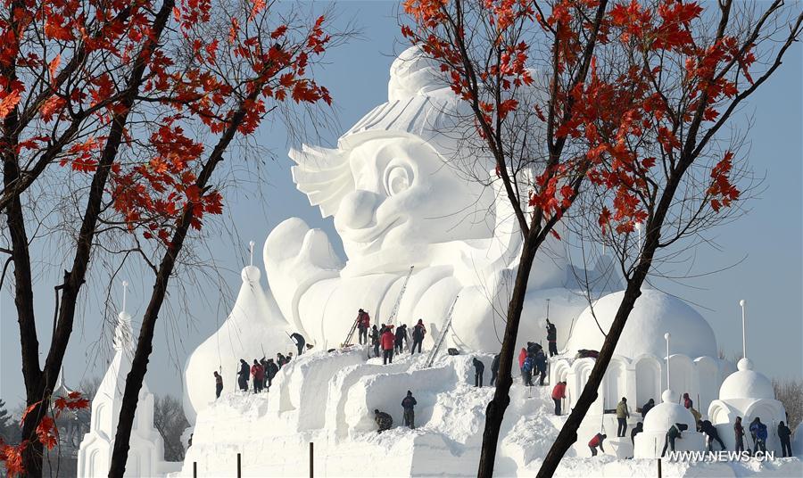 C A 34-meter-high snow sculpture, the tallest at the expo, revealed itself. 