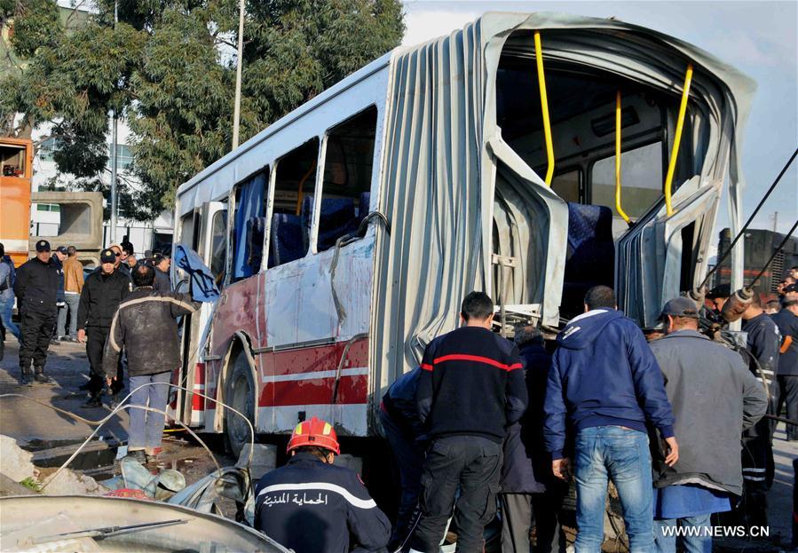 At least five people were killed and more than 40 injured on Wednesday when a train slammed into a public bus before dawn near Tunis