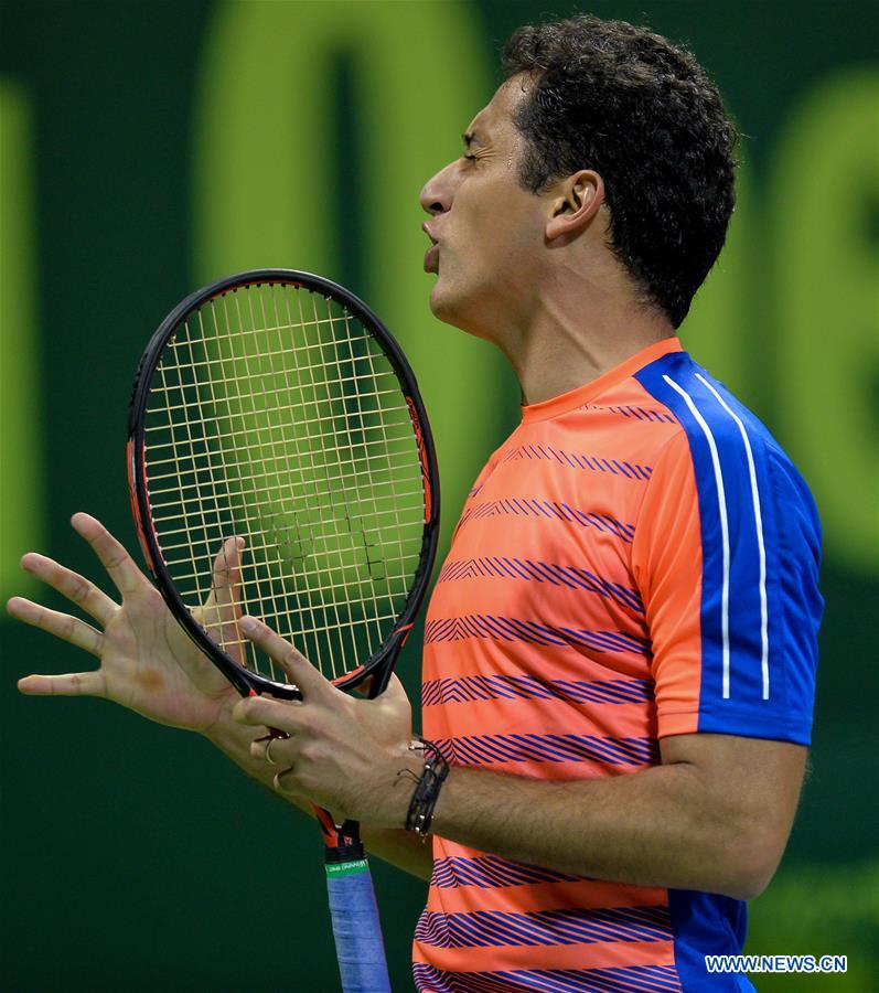 Nicolas Almagro of Spain reacts during a quarterfinal match against Andy Murray of Britain at the ATP Qatar Open tennis tournament in the Khalifa International Tennis Complex in Doha, capital of Qatar, on Jan. 5, 2017. Almagro lost 0-2. (Xinhua/Nikku) 
