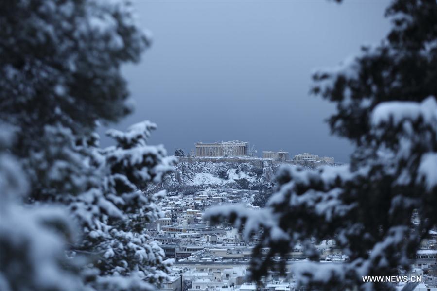 Photo taken on Jan. 10, 2017 shows the city of Athens of Greece in snow.
