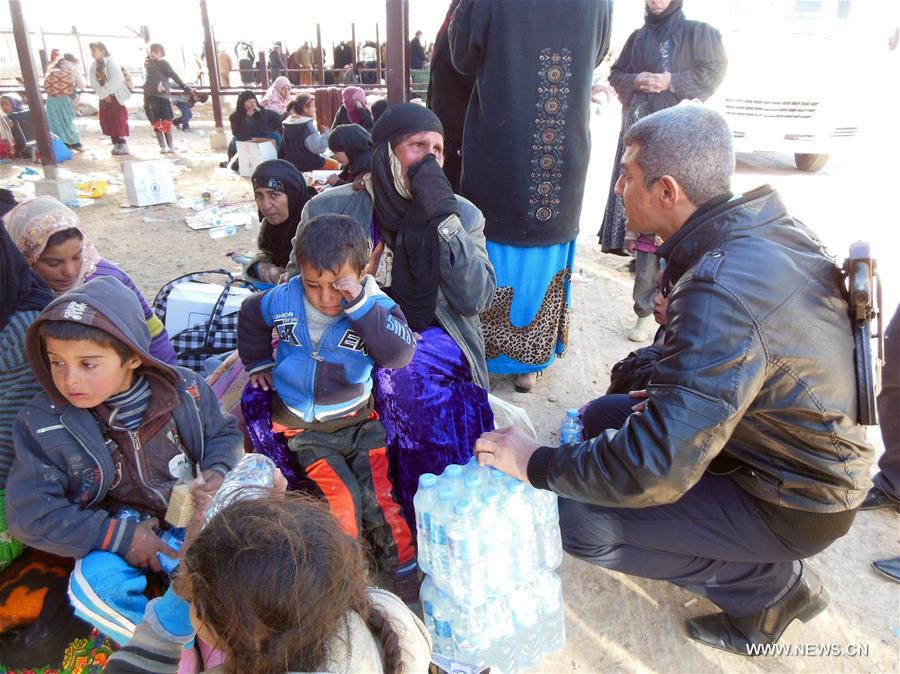 Families from the district of Hawija, 90km southwest of Kirkuk, gathered at the Khaled office in order to flee away from Islamic State (IS) militants.