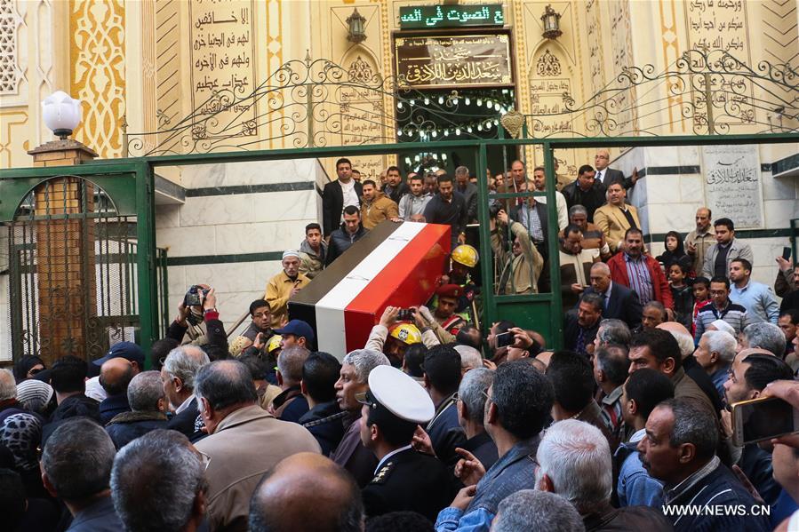 People carry the casket of police captain Hazem Osama during his military funeral in Alexandria, Egypt on Jan. 18, 2017. Hazem Osama and seven other security personnel were killed in an attack on a checkpoint in Egypt's New Valley Governorate, some 600 km south of Cairo. (Xinhua/Asmaa Abdelatif) 