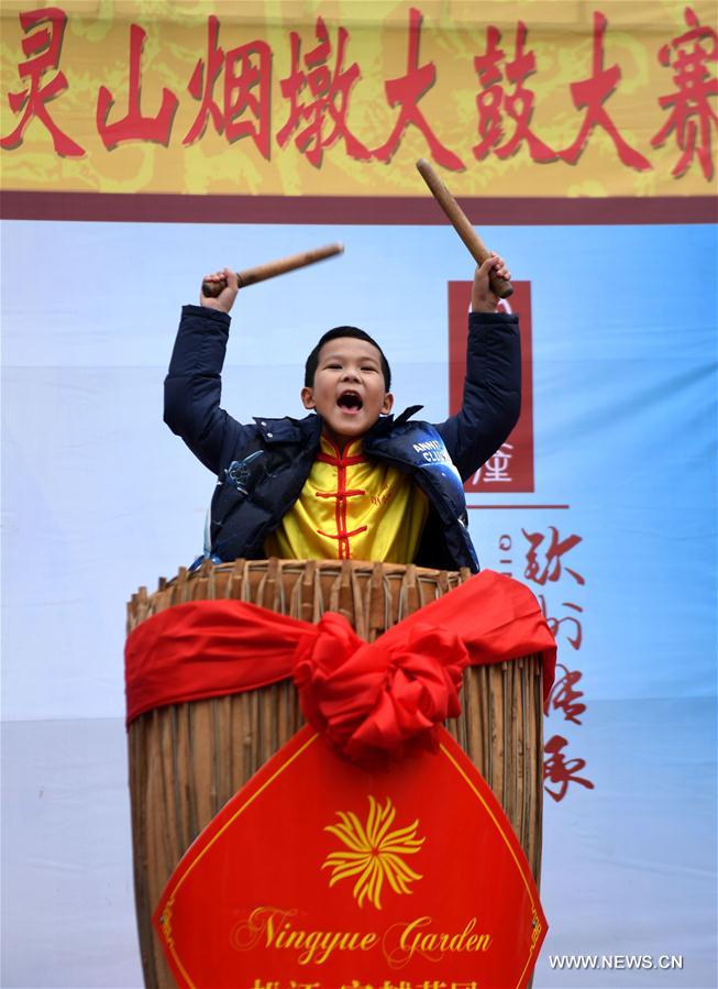 Competitors beat drums during a drum competition held to celebrate the Chinese Spring Festival in Qinzhou, south China's Guangxi Zhuang Autonomous Region, Feb. 2, 2017. (Xinhua/Zhang Ailin) 