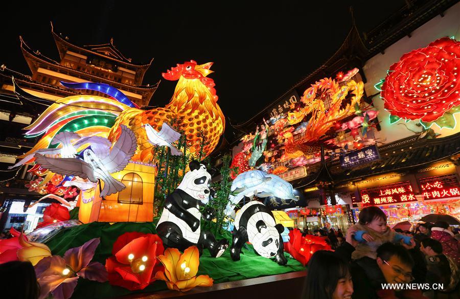 Tourists view the lanterns during a lantern festival in Yuyuan Garden in east China's Shanghai Municipality, Feb. 3, 2017.
