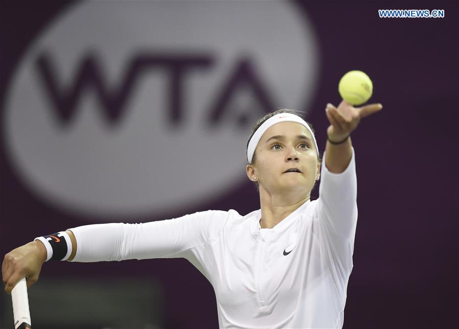 Lauren Davis of United States serves during the women's singles 2nd round qualifying match against Wang Qiang of China at WTA Qatar Open 2017 at the International Khalifa Tennis Complex of Doha, Qatar, Feb. 12, 2017. 