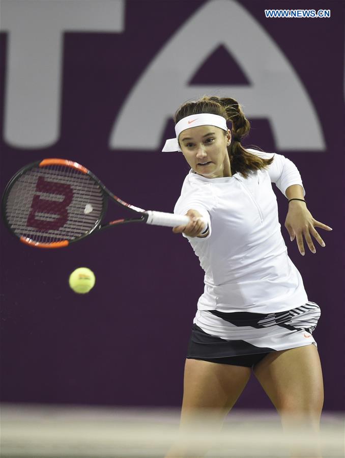Lauren Davis of United States returns the ball during the women's singles 2nd round qualifying match against Wang Qiang of China at WTA Qatar Open 2017 at the International Khalifa Tennis Complex of Doha, Qatar, Feb. 12, 2017. 