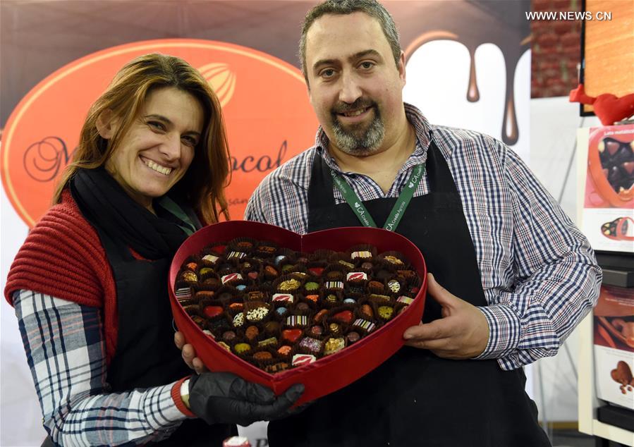 People display chocolates during a chocolate fair at Campo Pequeno Square in Lisbon, capital of Portugal, Feb. 12, 2017. 