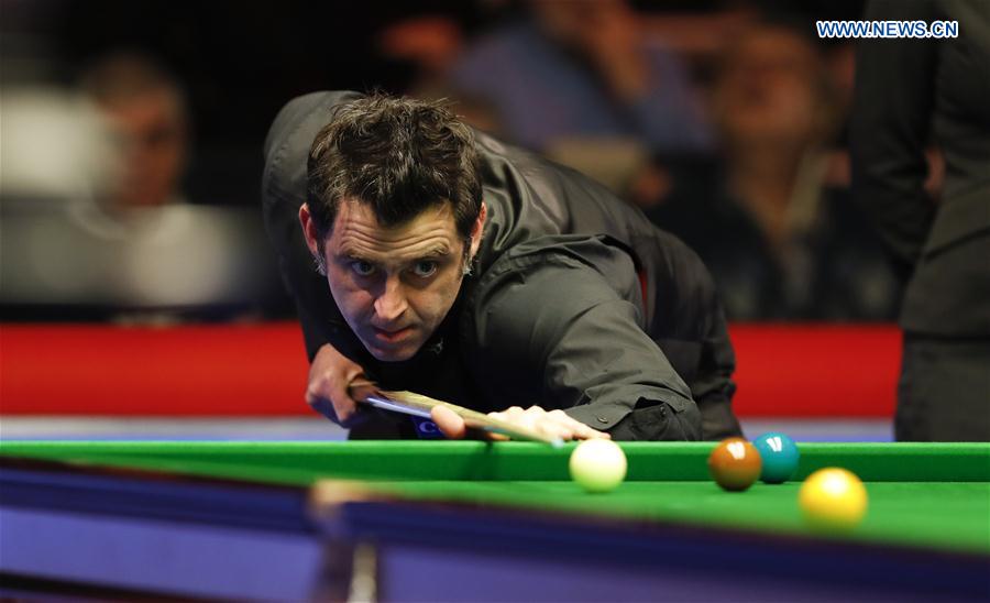 Ronnie O'Sullivan of England competes during his first round match with Tom Ford of England at Welsh Open 2017 in Cardiff, Wales, Britain on Feb. 14, 2017. 