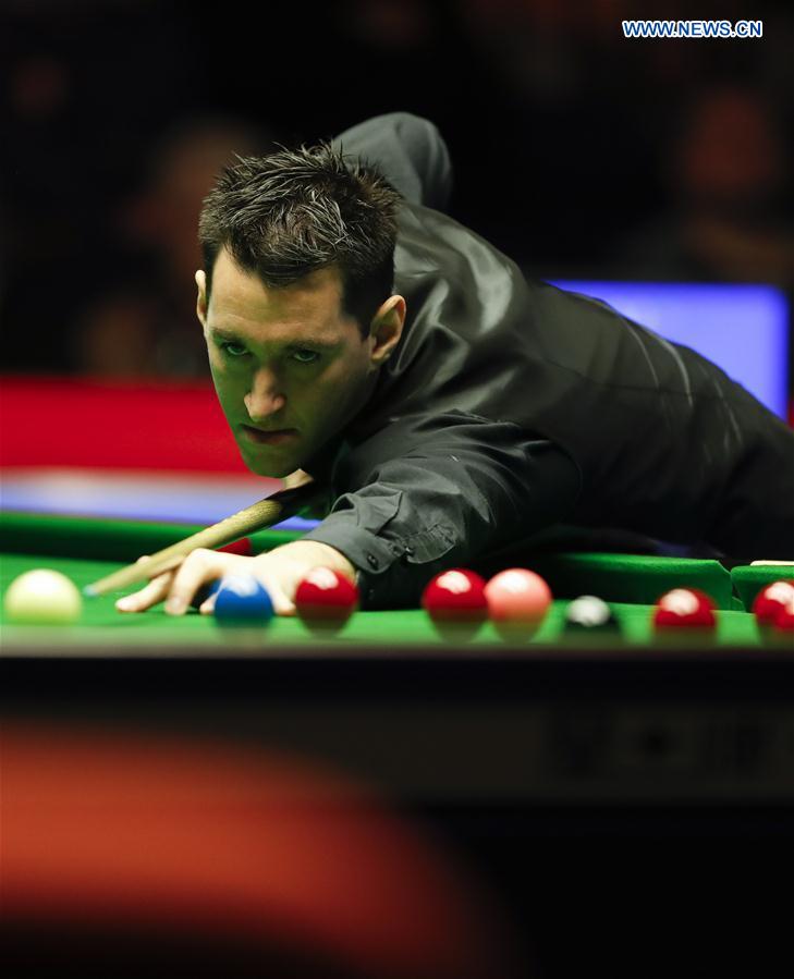 Tom Ford of England competes during his first round match with Ronnie O'Sullivan of England at Welsh Open 2017 in Cardiff, Wales, Britain on Feb. 14, 2017. 