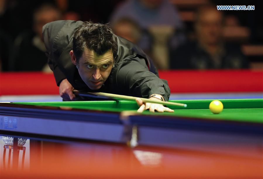 Ronnie O'Sullivan of England competes during his first round match with Tom Ford of England at Welsh Open 2017 in Cardiff, Wales, Britain on Feb. 14, 2017.