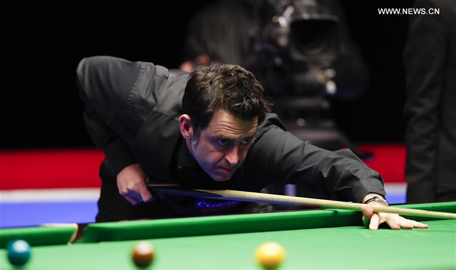 Ronnie O'Sullivan of England competes during the second round match against Mark Davis of England at Welsh Open 2017 in Cardiff, Wales, Britain on Feb. 15, 2017.