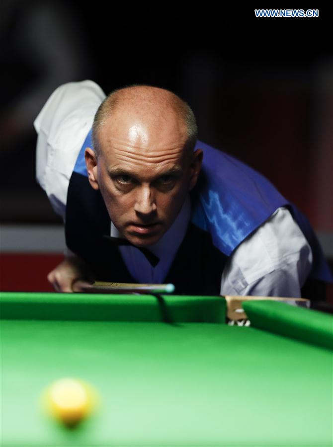 Peter Ebdon of England competes during the second round match against Mei Xiwen of China at Welsh Open 2017 in Cardiff, Wales, Britain on Feb. 15, 2017.