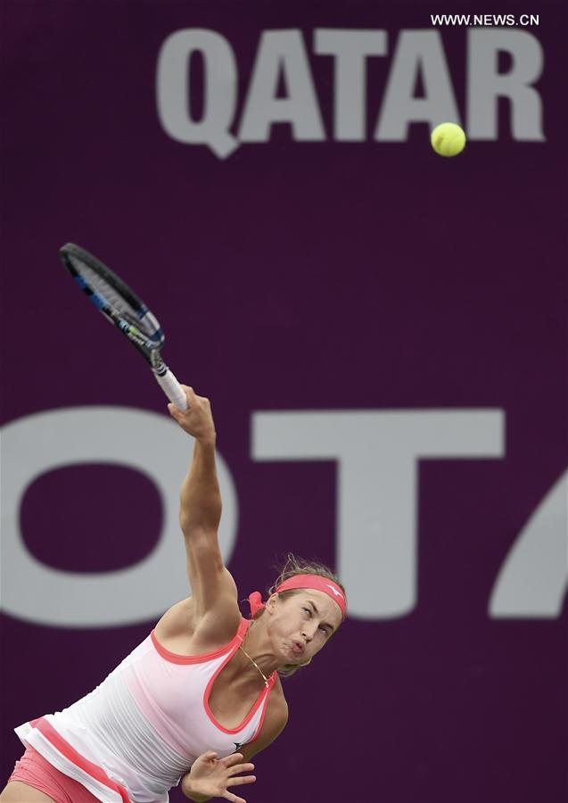 Yulia Putintseva of Kazakhstan serves during the singles second round match against at WTA Qatar Open 2017 at the International Khalifa Tennis Complex of Doha, Qatar, Feb. 15, 2017. 
