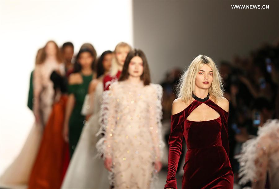 Models present creations of Bibhu Mohapatra during the 2017 New York Fashion Week in New York, the United States, on Feb. 15, 2017. 