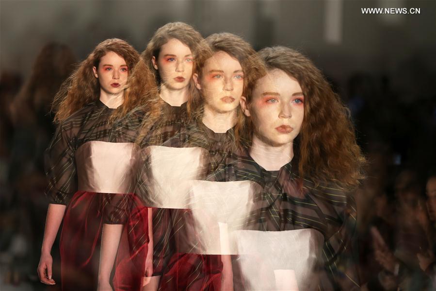 The multiple exposure photo shows a model presenting a creation of Bibhu Mohapatra during the 2017 New York Fashion Week in New York, the United States, on Feb. 15, 2017.