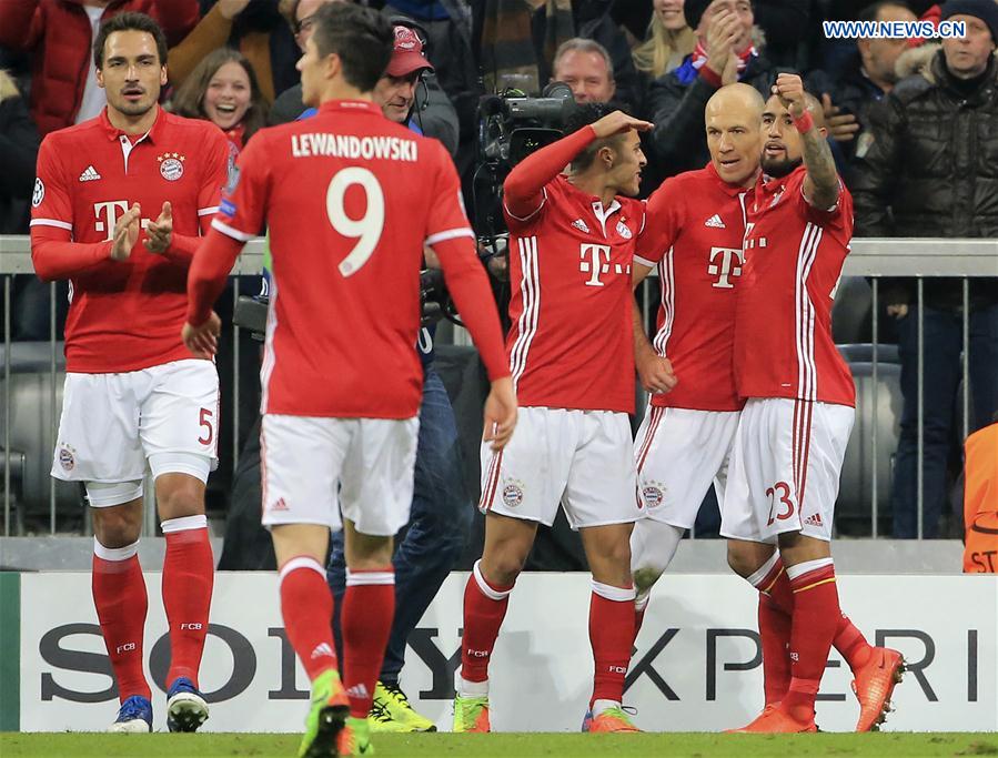 Bayern Munich's players celebtate scoring during the first leg match of Round of 16 of European Champions League between Bayern Munich and Arsenal in Munich, Germany, on Feb. 15, 2017. 