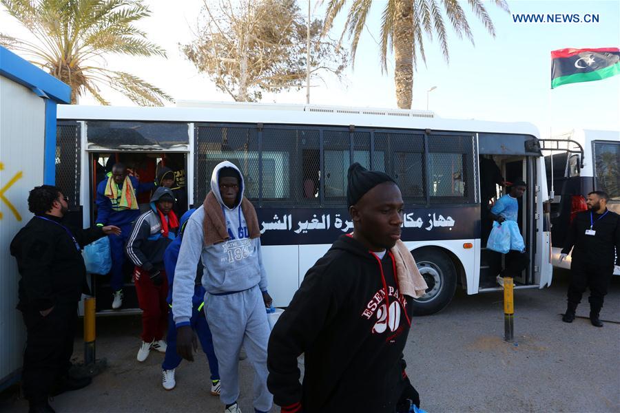 Senegalese immigrants enter Mitiga International Airport before being deported in Tripoli, capital of Libya, on Feb. 16, 2017.
