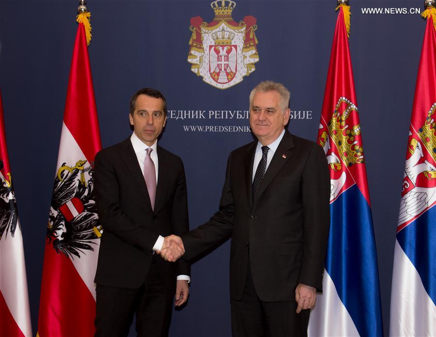 Austrian Chancellor Christian Kern (L) shakes hands with Serbian President Tomislav Nikolic before their meeting at the Palace of Serbia in Belgrade, Serbia, on Feb. 17, 2017.