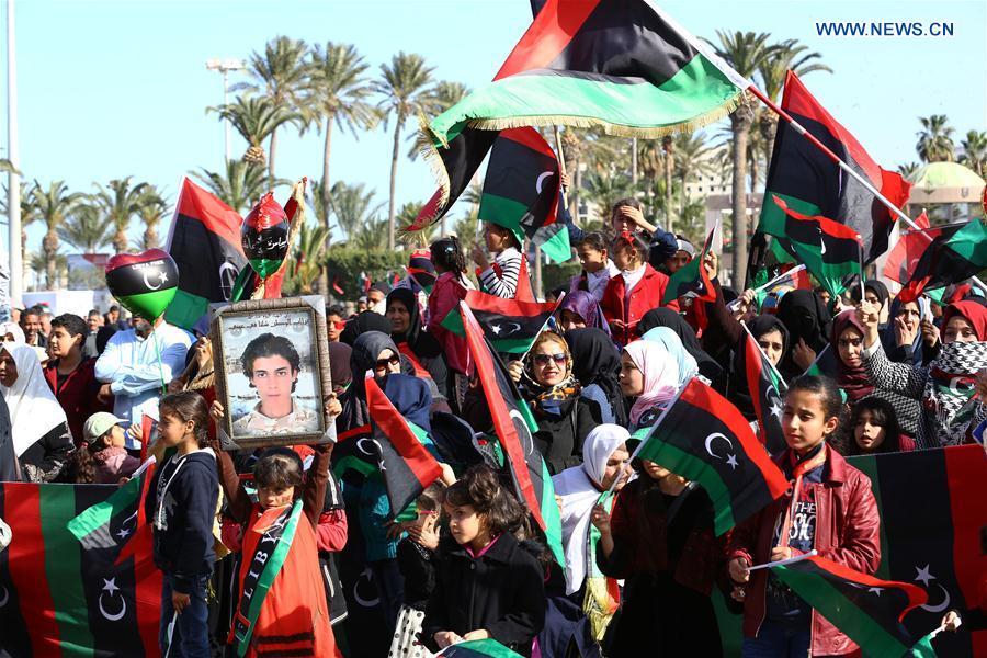 Libyans take part in a rally marking the sixth anniversary of the Libyan revolution in Tripoli, capital of Libya, on Feb. 17, 2017.