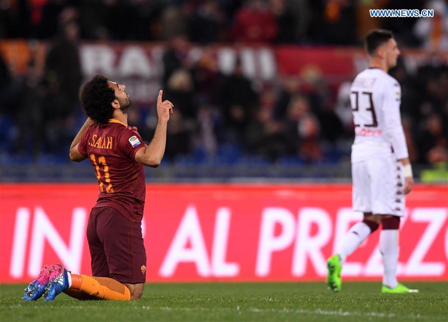 Roma's Mohammed Salah celebrates after scoring during a Serie A soccer match between Roma and Torino in Rome, Italy, Feb. 19, 2017. 