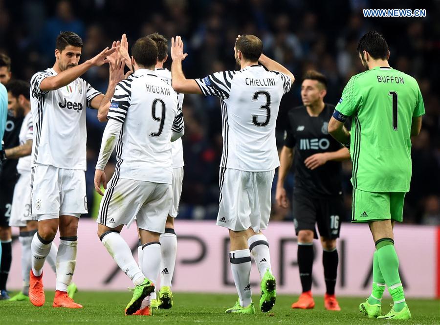 Juventus' players celebrate their victory after the first leg match Round of 16 of the UEFA Champions League between FC Porto and Juventus FC at Dragon stadium in Porto, Portugal, Feb. 22, 2017. 