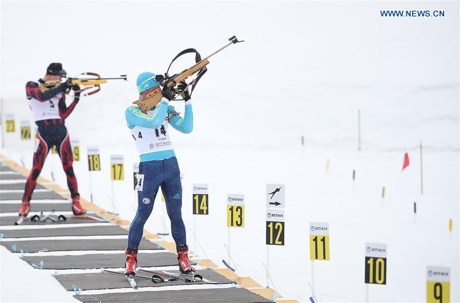 Vassiliy Podkorytov (front) of Kazakhstan competes during the men's 10km sprint of Biathlon at the 2017 Sapporo Asian Winter Games in Sapporo, Japan, Feb. 23, 2017. 
