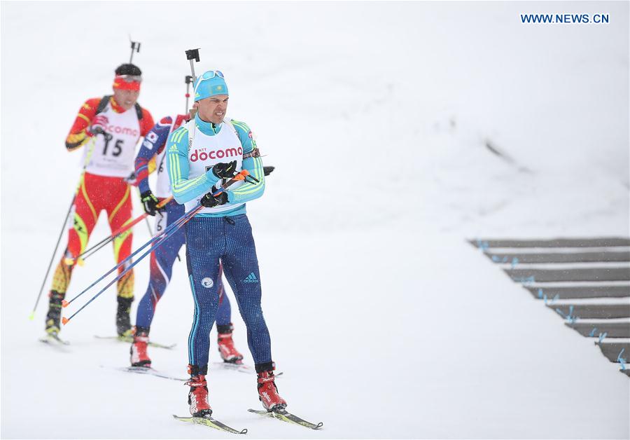 Yan Savitskiy (front) of Kazakhstan competes during the men's 10km sprint of Biathlon at the 2017 Sapporo Asian Winter Games in Sapporo, Japan, Feb. 23, 2017.