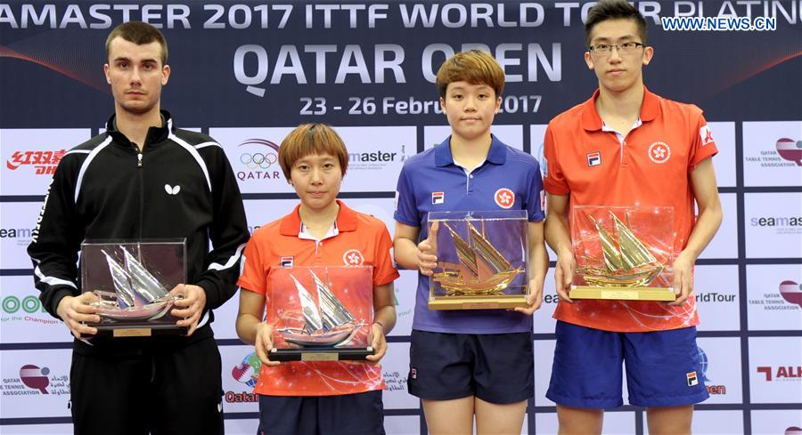 (L to R) U21 Men's singles runner-up Tomislav Pucar of Croatia, U21 Women's singles runner-up Soo Wai Yam Minnie, U21 Women's singles winner Doo Hoi Kem and U21 Men's singles winner Lam Siu Hang of Hong Kong, China, pose with their trophies during the awarding ceremony for the U21 Men's and Women's singles event at the 2017 ITTF World Tour Platinum, Qatar Open in Doha, capital of Qatar, Feb. 22, 2017. 