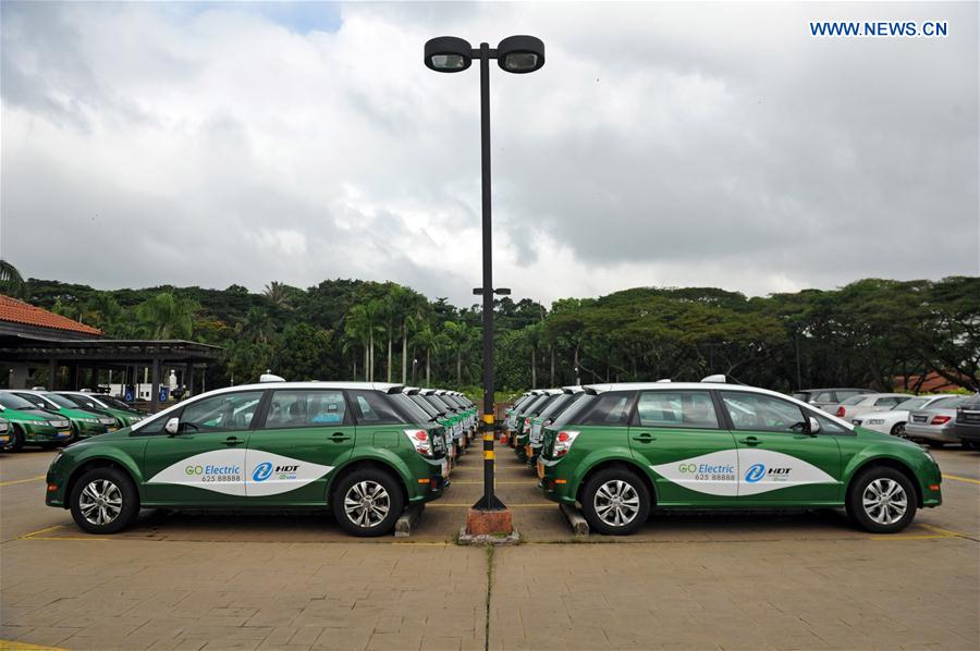 Some HDT electric taxis park at the event venue at the launch of the HDT Electric Taxi held in Singapore on Feb. 24, 2017.