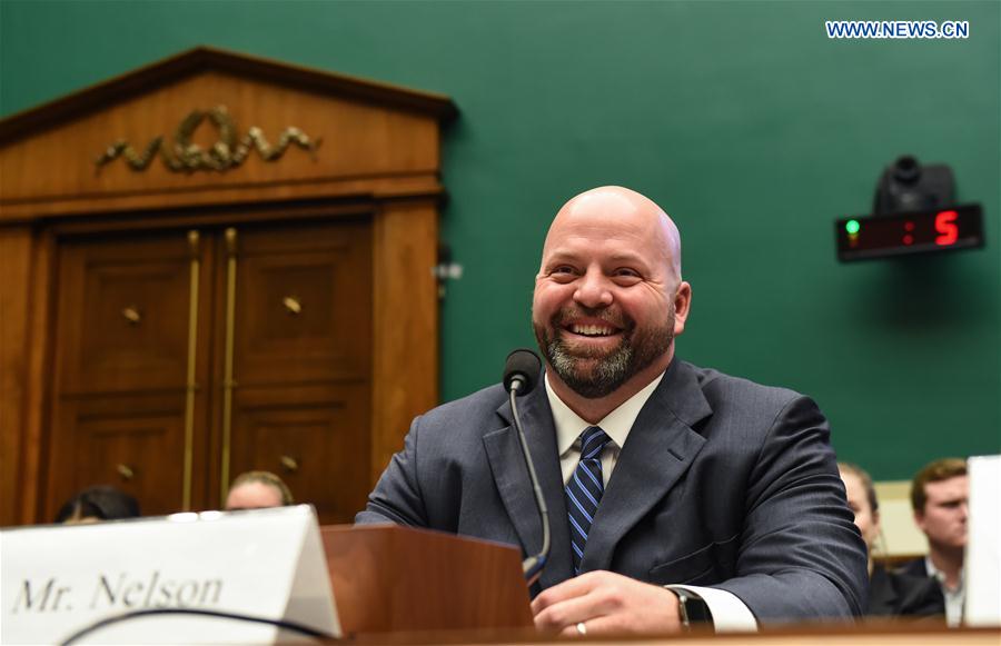 U.S. Olympic gold medalist Adam Nelson testifies before the House Energy and Commerce Subcommittee on Oversight and Investigations during a hearing on 'Ways to Improve and Strengthen the International Anti-Doping System' on the Capitol Hill in Washington D.C., the United States, Feb. 28, 2017.