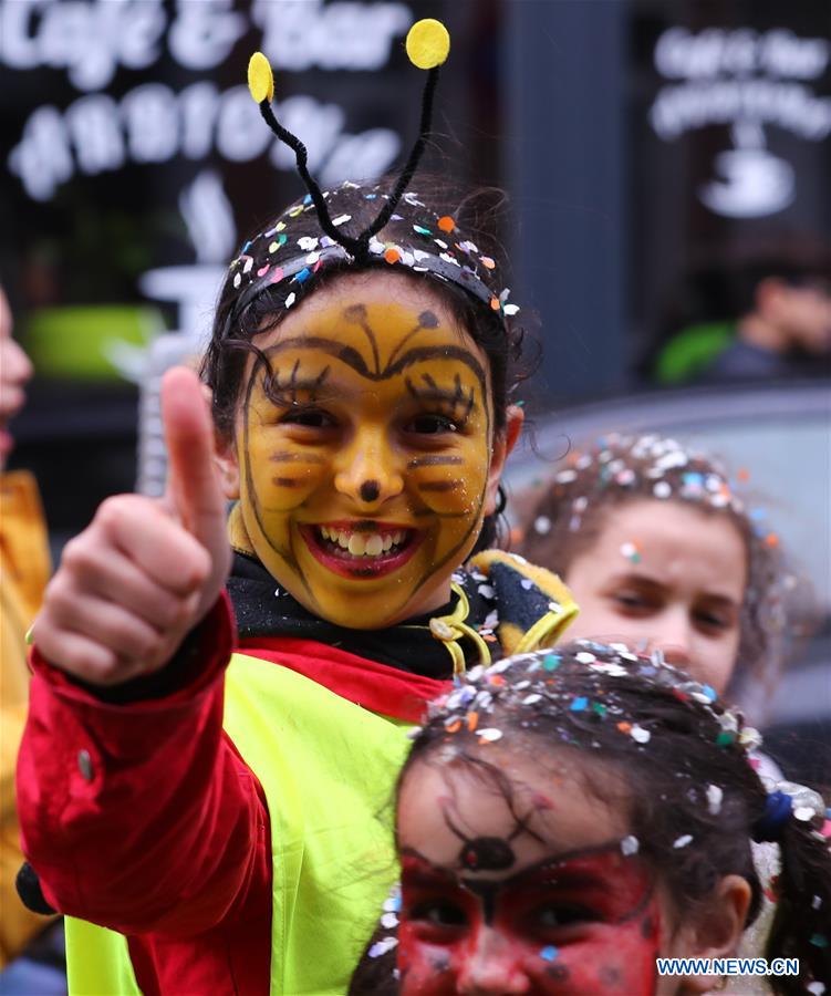 A girl takes part in a carnival for children in Brussels, capital of Belgium, Feb. 28, 2017. 