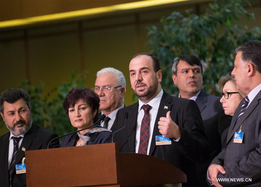 Syria's opposition delegation leader Nasr al-Hariri (front) attends a press conference at Palais des Nations in Geneva, Switzerland, March 3, 2017.