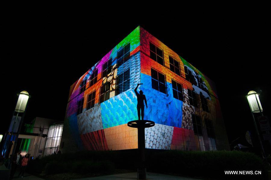  'Enlighten Canberra' is an annual cultural and creative activity held in March, during which major landmark buildings, including Parliament House, Old Parliament House, National Science and Technology Centre, National Library, will be lit up with colorful lights.