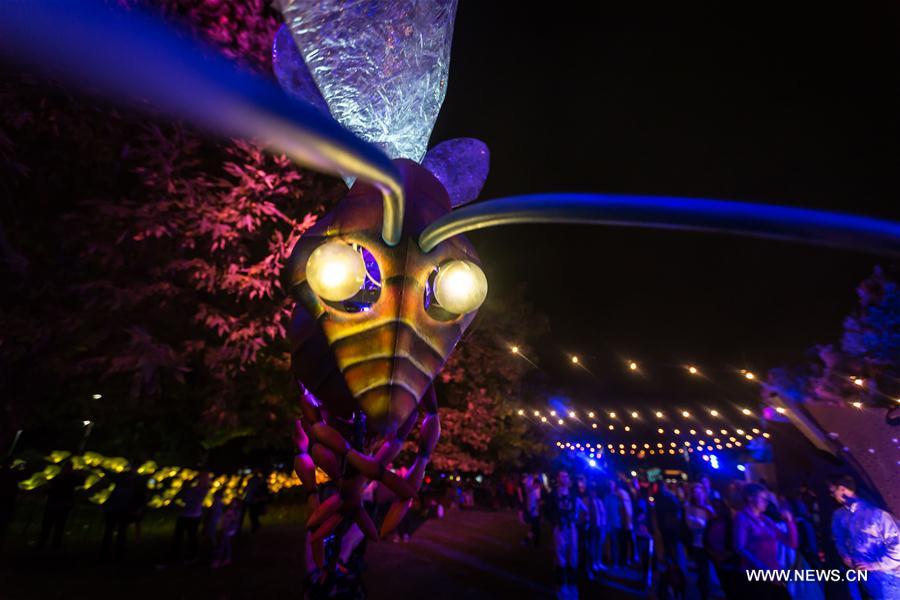 'Enlighten Canberra' is an annual cultural and creative activity held in March, during which major landmark buildings, including Parliament House, Old Parliament House, National Science and Technology Centre, National Library, will be lit up with colorful lights.