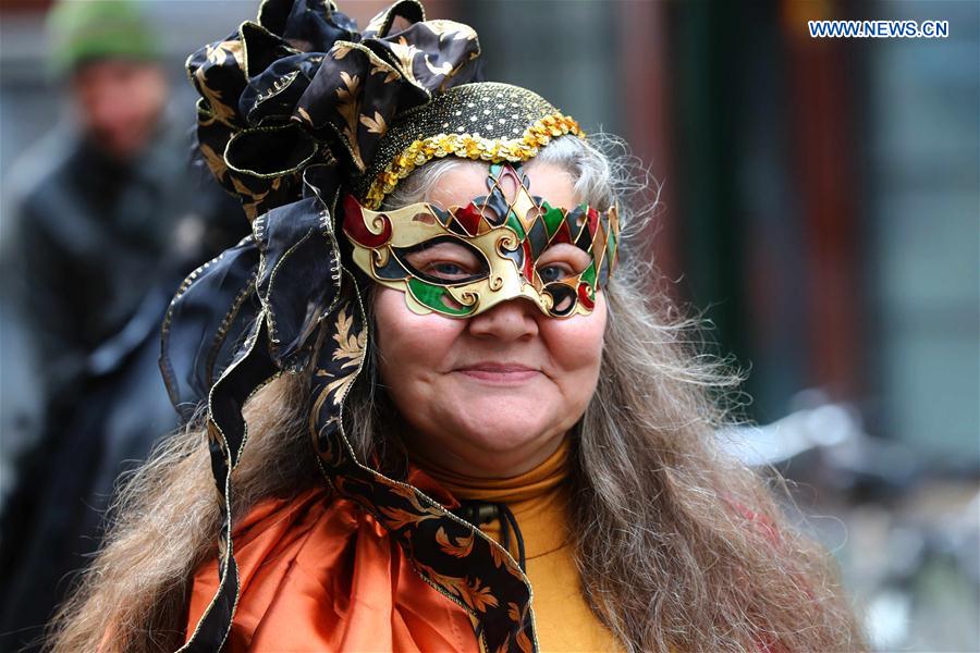 A woman takes part in the mask carnival in Brussels, Belgium, March 4, 2017. 