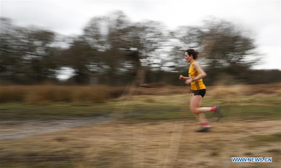 Competitors from a running club participate in a running race in southwest London's Richmond Park, Britain on March 4, 2017.