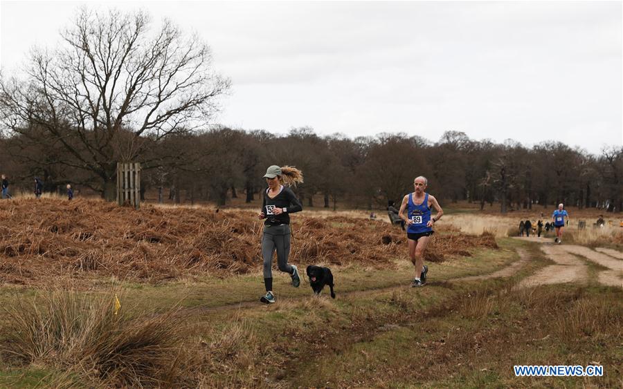 Competitors from a running club participate in a running race in southwest London's Richmond Park, Britain on March 4, 2017. 