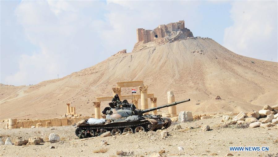 A Syrian army tank guards the ancient city of Palmyra, central Syria, on March 4, 2017. The Syrian army announced in a statement that the Syrian forces captured the ancient city of Palmyra in central Syria on Thursday after battles with the Islamic State (IS) group. 