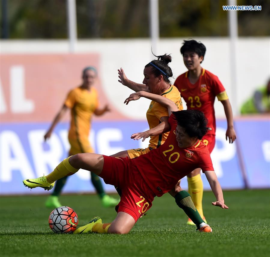 Zhang Rui(Front) of China vies with Lisa De Vanna of Australia during the last round of Group C match between China and Australia at the Algarve Cup 2017 women's soccer tournament in Albufeira, Portugal on March 6, 2017.