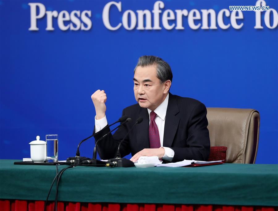Chinese Foreign Minister Wang Yi answers questions on China's foreign policy and foreign relations at a press conference for the fifth session of the 12th National People's Congress in Beijing, capital of China, March 8, 2017. 