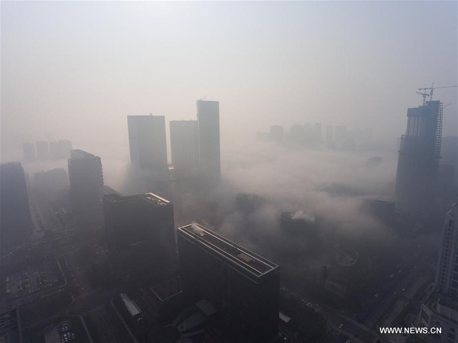Photo taken on March 8, 2017 shows fog-shrouded buildings in Chengdu, capital of southwest China's Sichuan Province. (Xinhua/Jiang Hongjing)