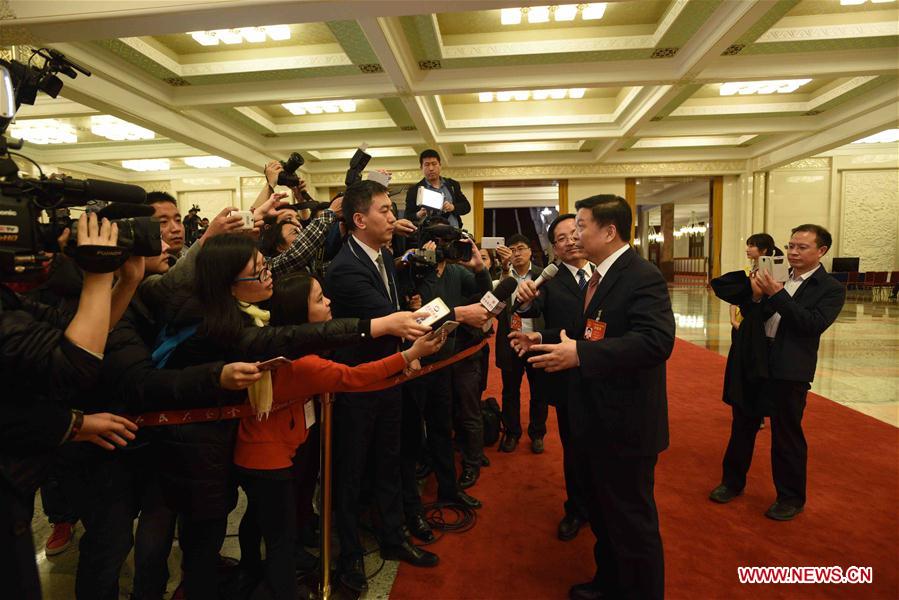 Chinese Minister of Land and Resources Jiang Daming receives an interview after the second plenary meeting of the fifth session of the 12th National People's Congress at the Great Hall of the People in Beijing, capital of China, March 8, 2017. (Xinhua/Wang Jianhua) 