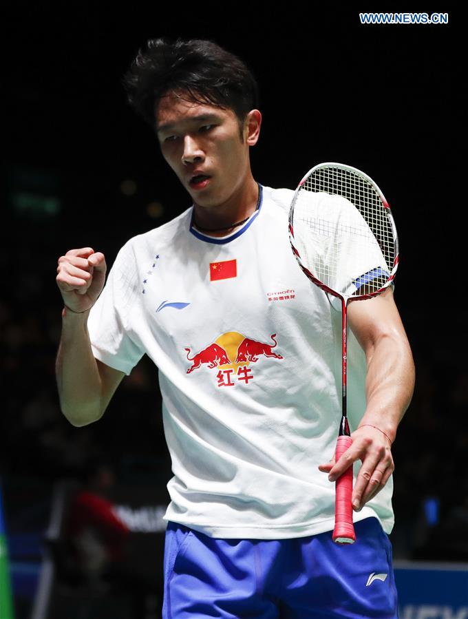 China's Tian Houwei reacts during the men's singles first round match with Tommy Sugiarto of Indonesia at All England Open Badminton 2017 in Birmingham, Britain on March 8, 2017.